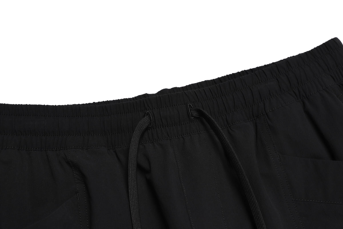 Unisex Adelie Lightweight Woven Stretched Tapered Pants- Carbon Black
