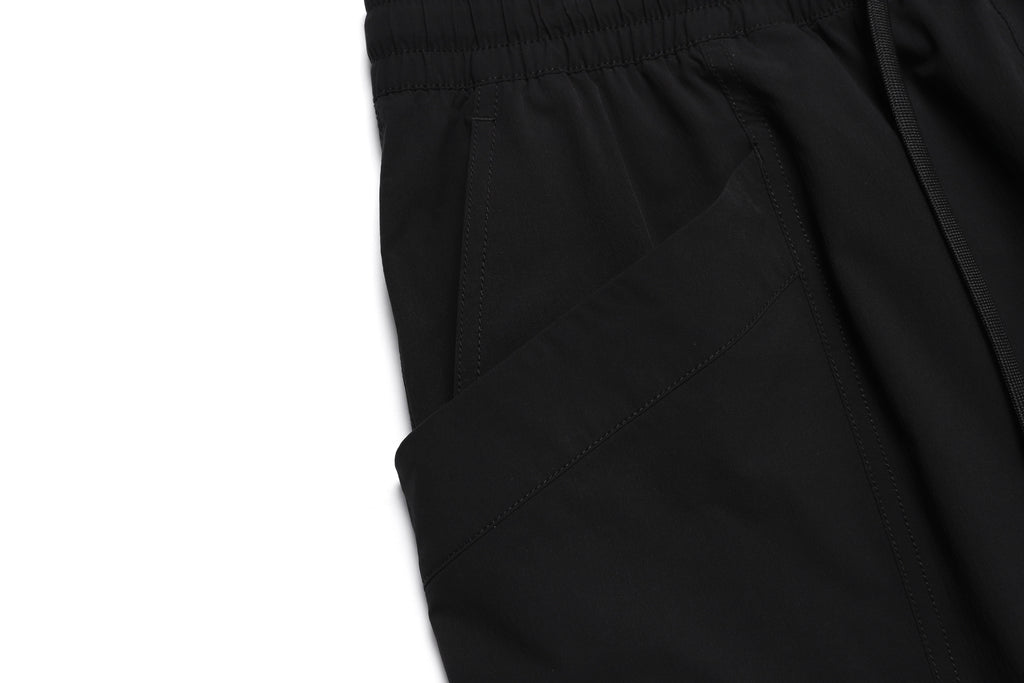 Unisex Adelie Lightweight Woven Stretched Tapered Pants- Carbon Black