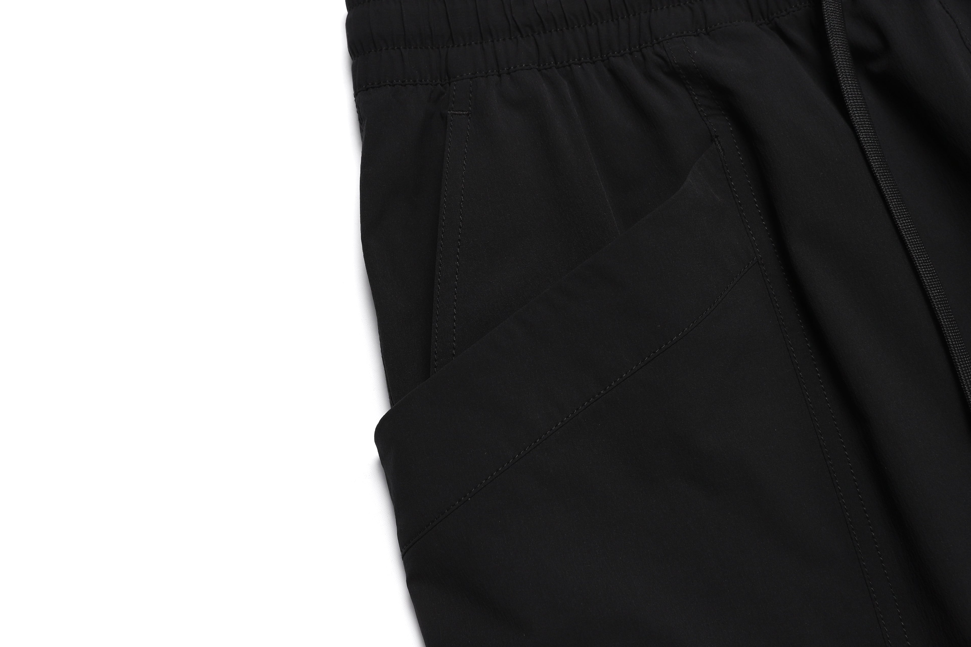 Unisex Adelie Lightweight Woven Stretched Tapered Pants- Carbon Black